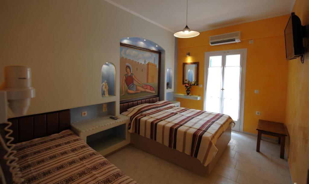 Orfeas Apartments Kamári Quarto foto